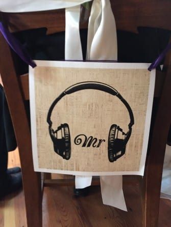 Mr & mrs headphones on a chair.