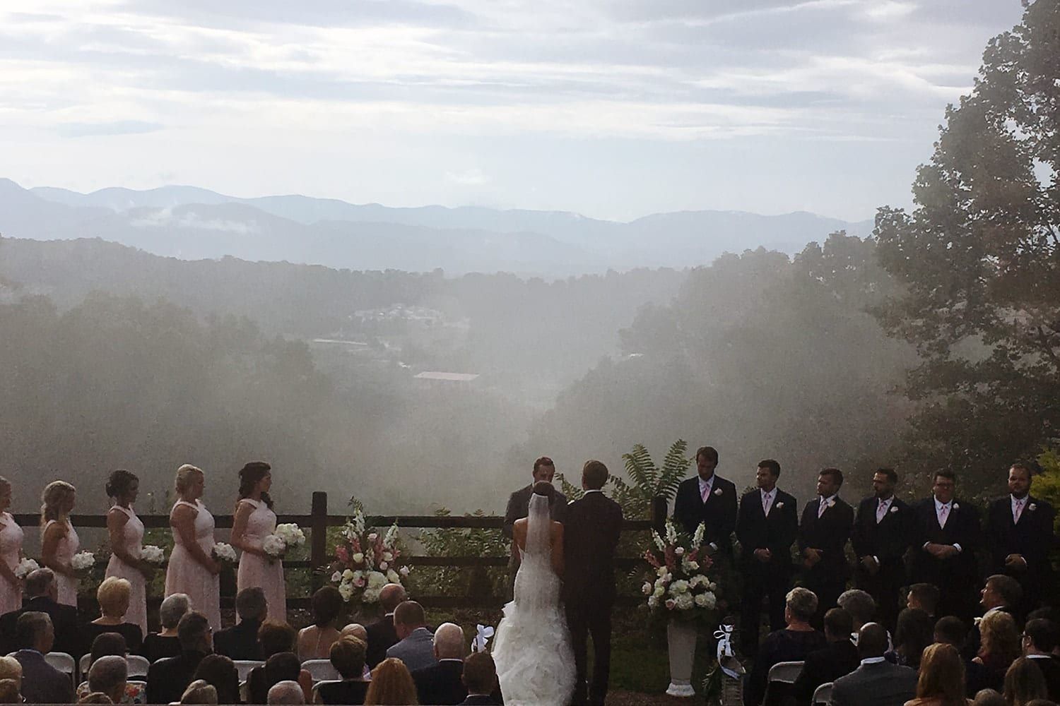 wedding dj view of an outdoor wedding ceremony in asheville, nc